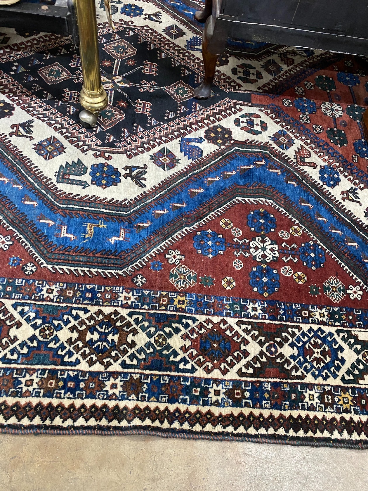 A Shiraz carpet, 338 x 220cm